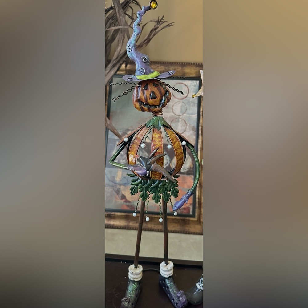 Whimsical Metal Art Sculpture in Multi color.